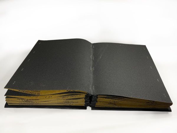 Zımpara defteri, 2025, Sandpaper, staples, string, paper, cardboard, 22 x 29 x 17 cm.